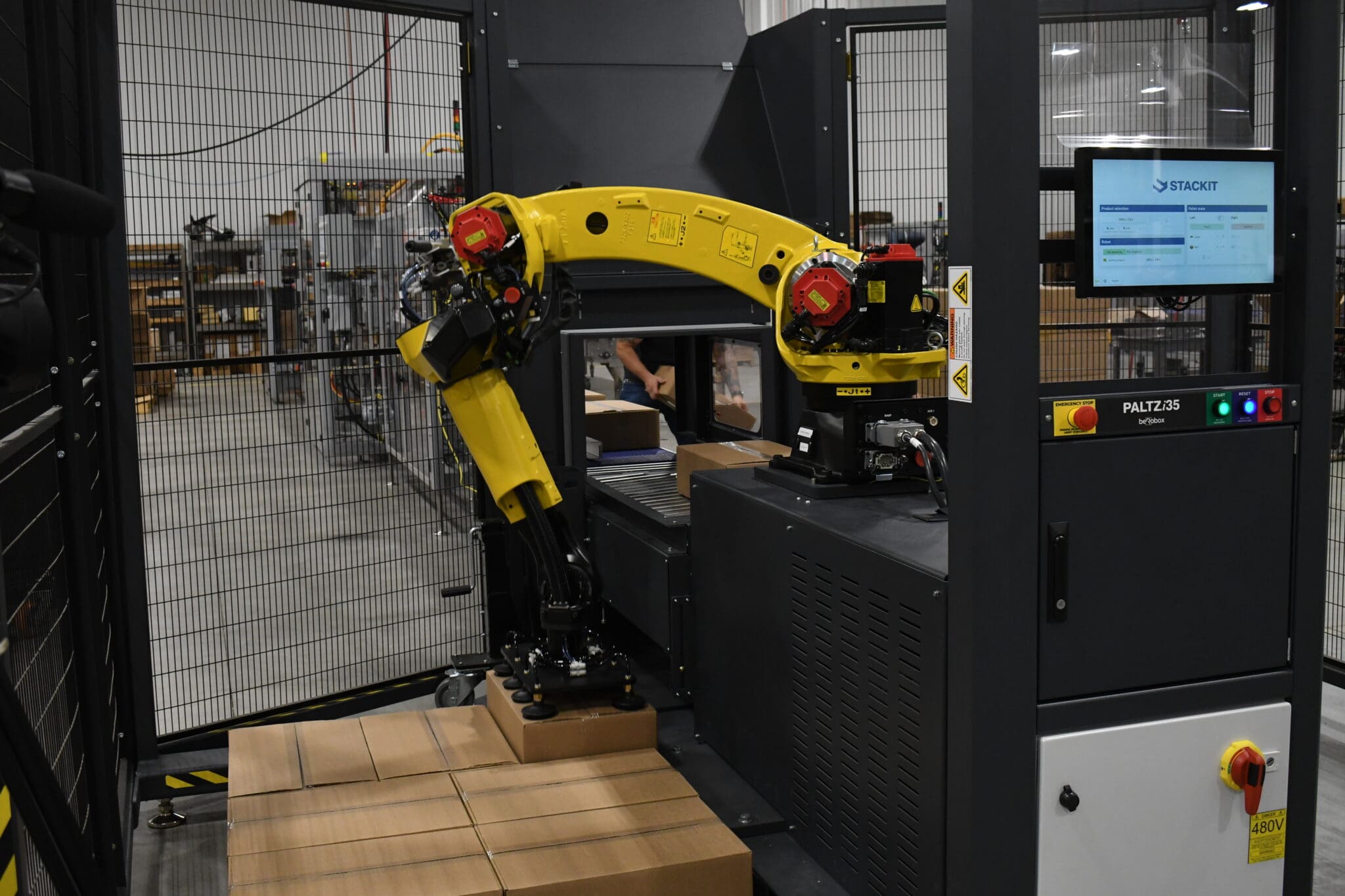 Robotic palletizer adding a case to a pallet